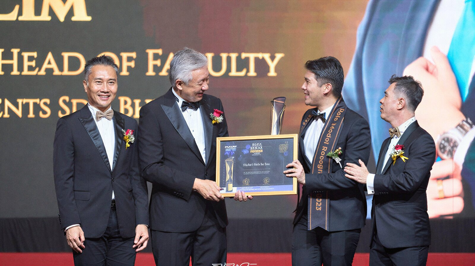 freepik__photo-three-asian-men-in-formal-wear-on-a-stage-re__4773